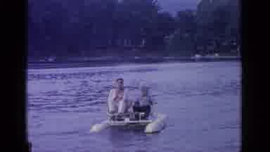 Greenwood Lake New York (1964): Father And Son Paddling Backwards On A Boat On