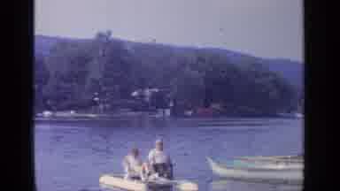 Greenwood Lake New York (1964): People In A Boat Being Peddled By Their Feet