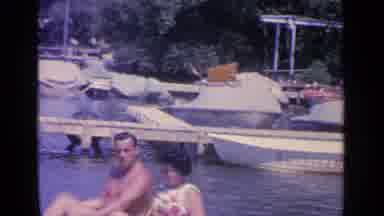 Greenwood Lake New York (1964): A Couple Paddling A Float On The River And The