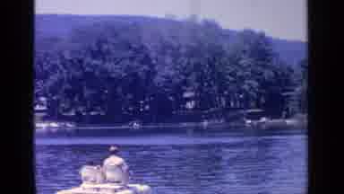 Greenwood Lake New York (1964): In A Lake Surrounded By Tall Green Trees And