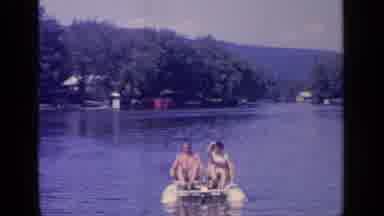 Greenwood Lake New York (1964): Two People Riding In A Paddle Boat On A Bright