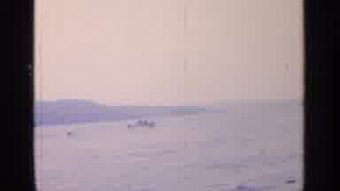 Greenwood Lake New York (1964): A Boat Moving Across A Body Of Water With People