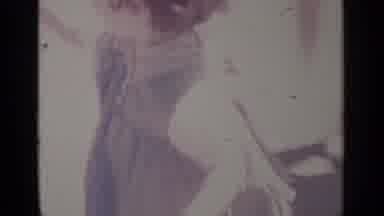 Greenwood Lake New York (1964): Girl Wearing Blue Dress Walks To Mickey Mouse