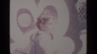 Greenwood Lake New York (1964): Girl Wearing Blue Dress Looks At Mickey Mouse