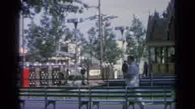 Flushing Meadows New York (1964): Man In A Gray Suit Walks In The Park On A Sunny