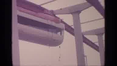 Flushing Meadows New York-1964: Monorail Moves Along Track Overhead And Approaches Building