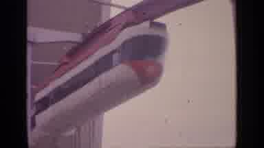 Flushing Meadows New York (1964): A Red And White Monorail Enters A Multi-Windowed