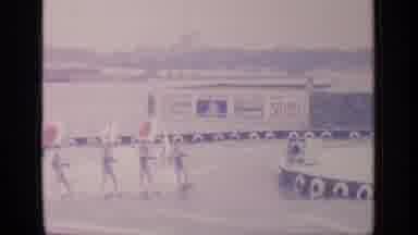 Flushing Meadows New York (1964): Man Driving A Speed Boat Pulling 4 Ladies With