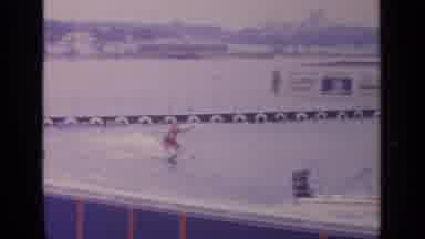 Flushing Meadows New York (1964): Stunt Waterskier Wearing Red Swimwear Prepares