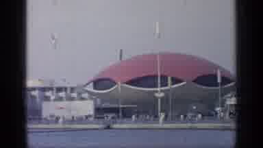 Flushing Meadows New York (1964): A View Of A Large Building And A Pool Of