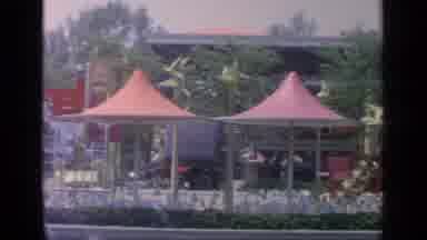 Flushing Meadows New York (1964): Tents Set Up Outside Of A Building And People