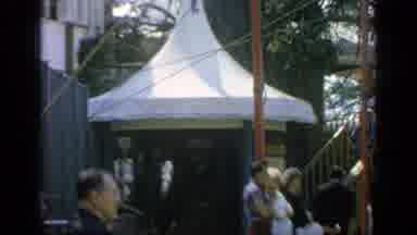Flushing Meadows New York (1964): Street Spectators Watches Native Dance