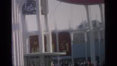 Flushing Meadows New York (1964): Adult Male Swinging On A Swing Outside With A