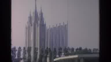Flushing Meadows New York (1964): People Walking In A Park Under A Grey Sky