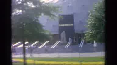 Flushing Meadows New York (1964): People Walking Past White And Yellow Flowers On