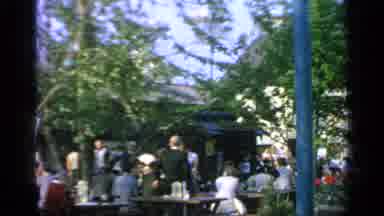 Flushing Meadows New York (1964): Scene From A Country Fair With People Sitting At
