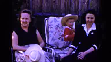Long Island New York (1965): Family Sitting On Lawn Chairs Talking With Each Other