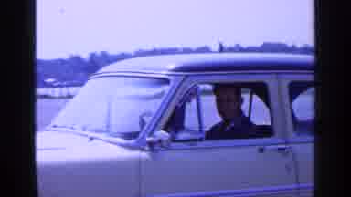 Long Island New York (1965): Man In A Yellow Car Looking Towards The Direction Of