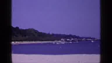 Long Island New York (1965): Smiling Woman And Child Leave Building Followed By
