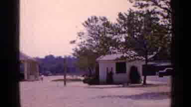 Long Island New York (1965): View Of Yellow Wooden Shed On A Bright Sunny Day