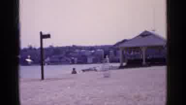 Long Island New York (1965): A Middle Aged Man Gets Into An Old Yellow Car