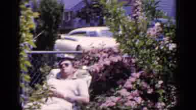 Long Island New York (1965): A Man In Sunglasses Rests On A Lounge Chair Beside A