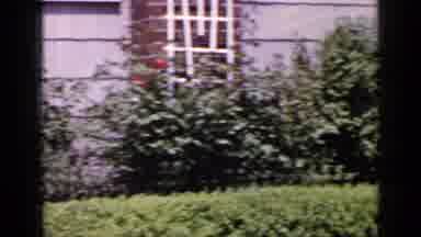 Long Island New York (1965): Man Walks Down The Sidewalk And Takes Advantage Of