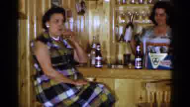 Long Island New York (1965): One Lady Raises Her Glass Then Woman Raises A Bottle