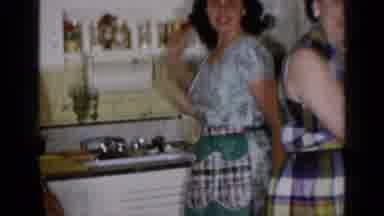 Long Island New York (1965): Family Playfully Plays While All Gathered In Kitchen