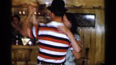Long Island New York (1965): Man Wearing Striped Shirt And Woman Wearing Floral