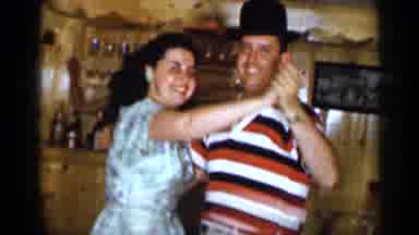 Long Island New York (1965): A Man And A Woman Dancing While Wearing Colorful
