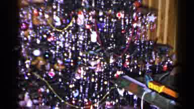 LONG ISLAND NEW YORK-1965: Christmas Tree Covered In Tinsel With Wrapped Presents