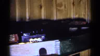 Long Island New York (1965): Toy Train Going Down The Tracks On A Small Bridge