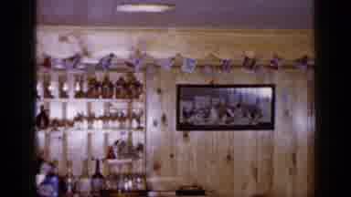 Long Island New York (1965): A Woman Sits On A Stool At The Counter Of A Liquor