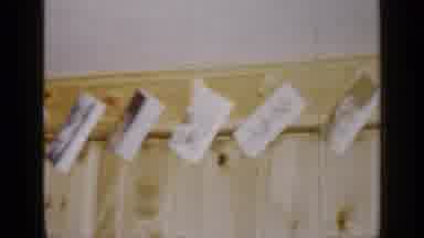 Long Island New York (1965): Many Pictures Hanging On A Wooden Wall That Are