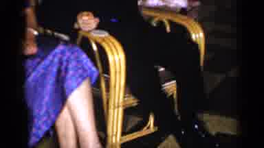 Long Island New York (1965): Man And Woman Sitting In Wicker Chairs Having A Drink