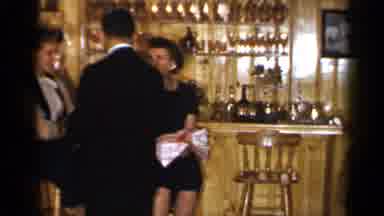 Long Island New York (1965): People Talking And Chatting By A Bar Indoors