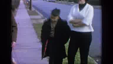 Long Island New York (1965): Two Women And A Young Boy Walking On Sidewalk With