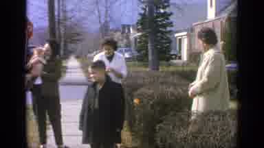 Long Island New York (1965): Three Women And Child Stand Outside By A Stop Sign
