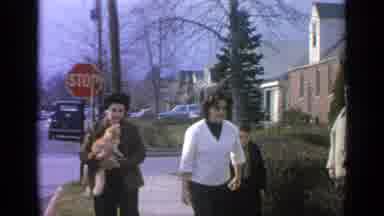 Long Island New York (1965): Woman Leads Boy Down The Walk Next To Woman With A