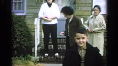 Long Island New York (1965): Four People Standing Outside A House While One Of The