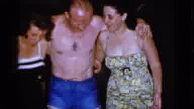Mineola New York (1966): A Trio Of People In Bathing Suits Dance And Act Silly