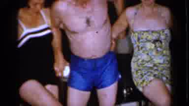 Mineola New York (1966): Man And Two Women Dance And Unwrap Toilet Paper Roll