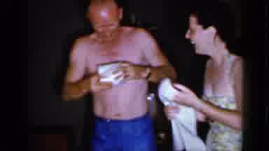 Mineola New York (1966): Women And Man Handle Light Tissue Paper And Laugh At Each