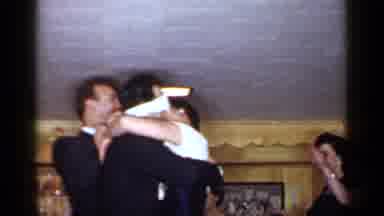 Mineola New York (1966): Man And Woman Passionately Embracing Whilst Playing An