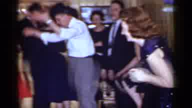 Mineola New York (1966): Man Kissing Women At A Party While Others Dance And Have