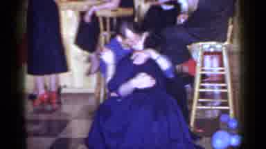Mineola New York (1966): People Kissing At A Gathering And Others Swimming On A