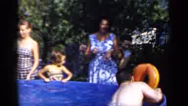 Mineola New York (1966): People Standing Around A Small Pool As Three People Swim