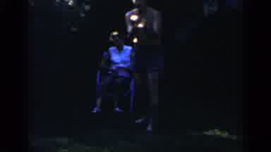 Mineola New York (1966): Man Wearing Blue Shorts Plays Game Of Horseshoe On A