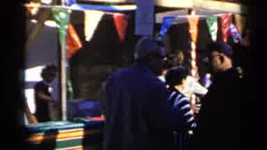 Mineola New York (1966): Person In Black And White Shirt Walking Through Crowd Of